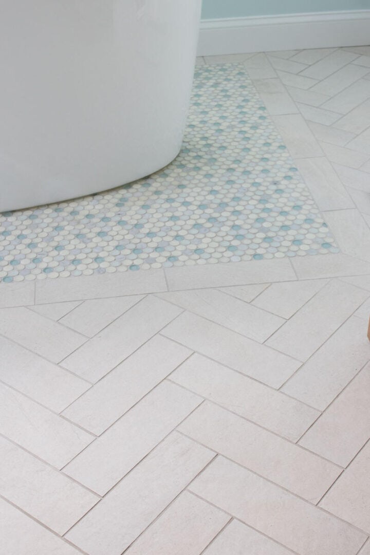 coastal-bathroom-with-herringbone-and-penny-tile-floor-720x1080-1 coastal-bathroom-with-herringbone-and-penny-tile-floor