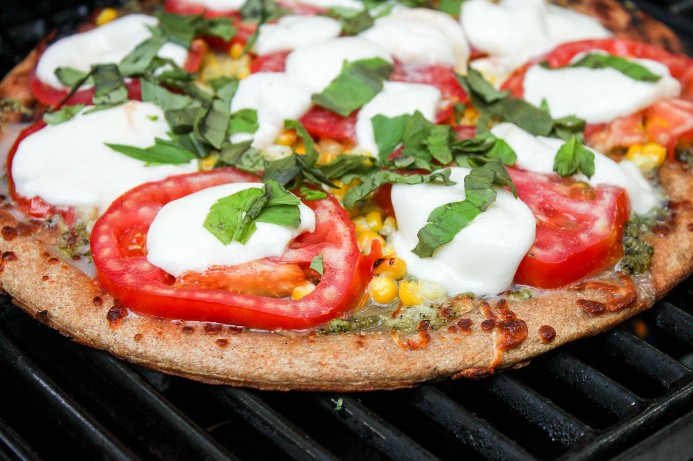 finished-cooking-corn-pesto-pizza-on-grill Grilled Corn Pesto Pizza