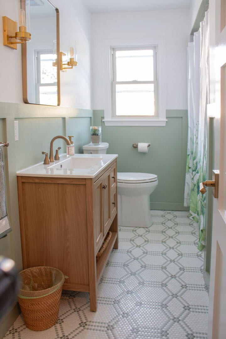 green-bathroom-with-wood-vanity-and-brass-accnets-720x1080-1 green-bathroom-with-wood-vanity-and-brass-accnets