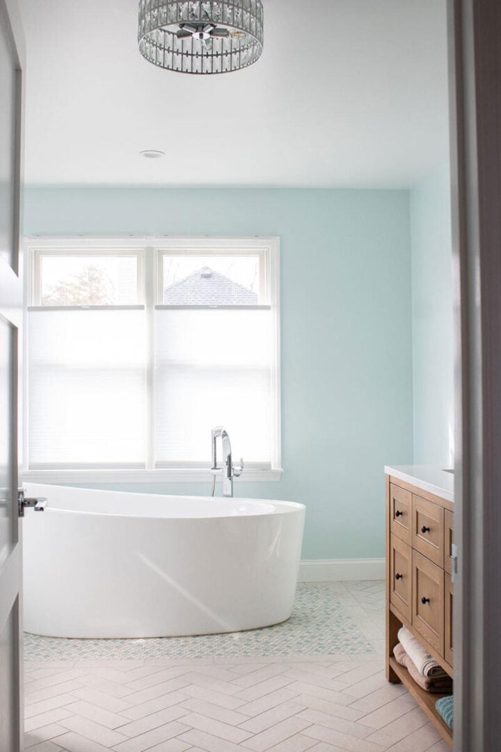 modern-coastal-bathroom-design-with-freestanding-tub-720x1080-1 modern-coastal-bathroom-design-with-freestanding-tub - bathroom tub surround tile ideas