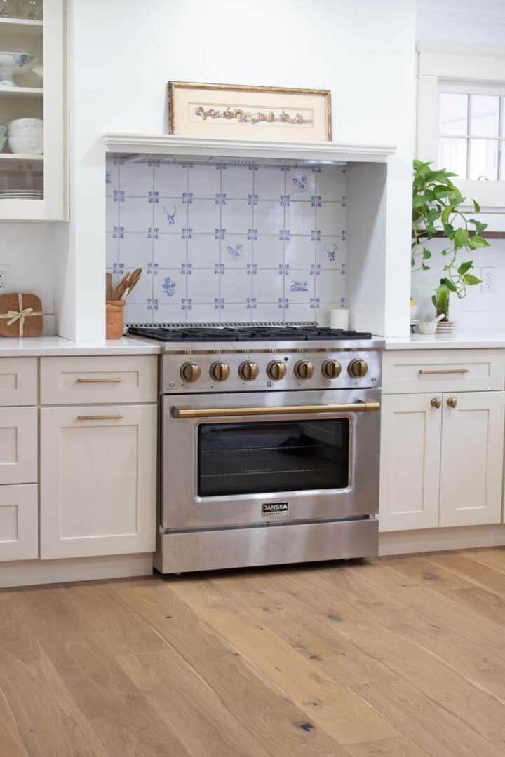 pattern-tile-backsplash-over-kitchen-range-720x1080-1 country kitchen style backsplash ideas over range